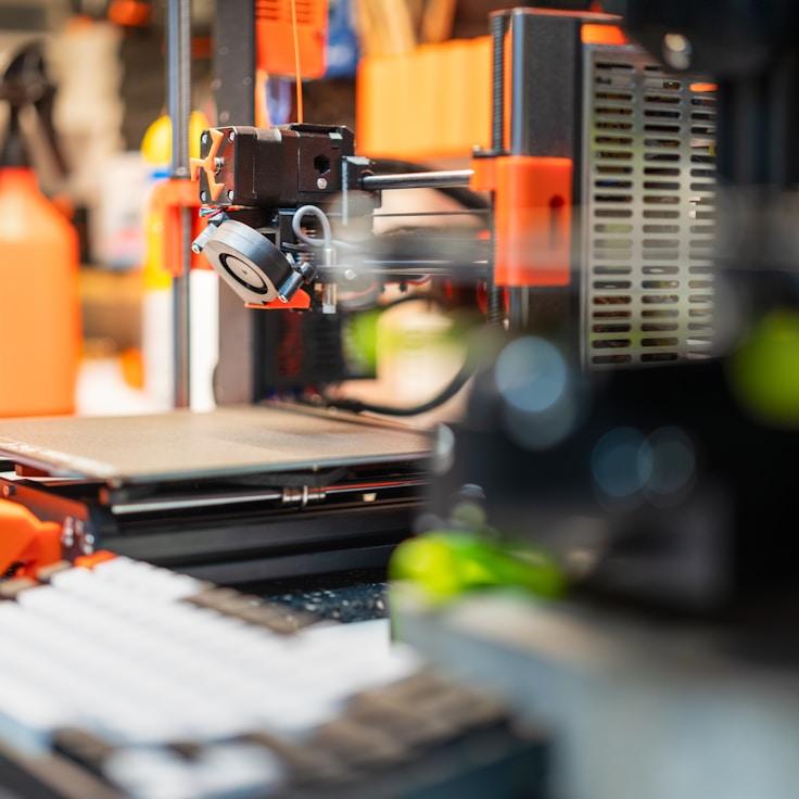 Mobile app project planning workspace with devices and development tools